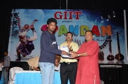 2nd Topper in (BscIT-6) Award to Pawan Koya by Mr. Dineshanand Goswami with Mr. Om Prakash